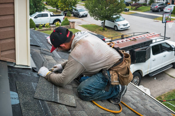 Professional Roof Replacement technician working in Blue Point, NY